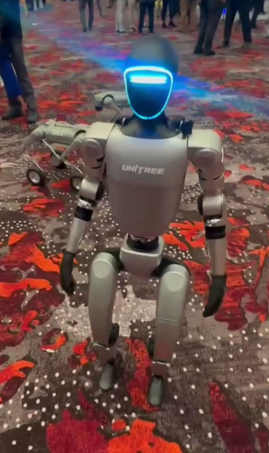 Unitree's G1 humanoid robot on a trade-show floor