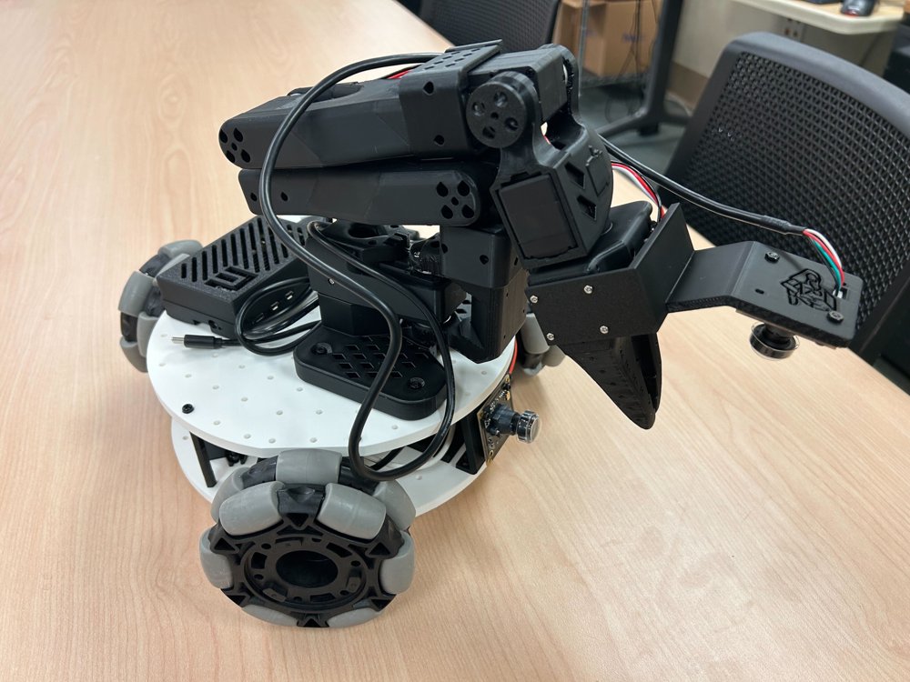 Assembled LeKiwi mobile robot — a robot arm mounted on a 3D-printed, three-wheel omnidirectional base
