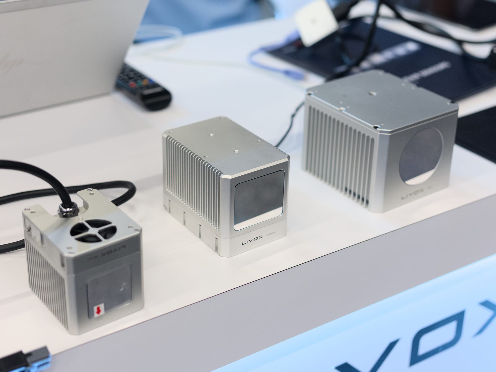 Three Livox solid-state LiDAR units side by side